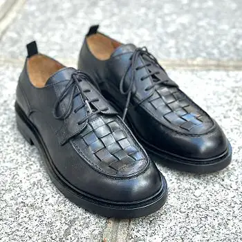 Elia Maurizi Derbies cuir noir tressees