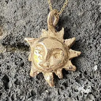 Ombre Claire charm pendentif Soleil bronze